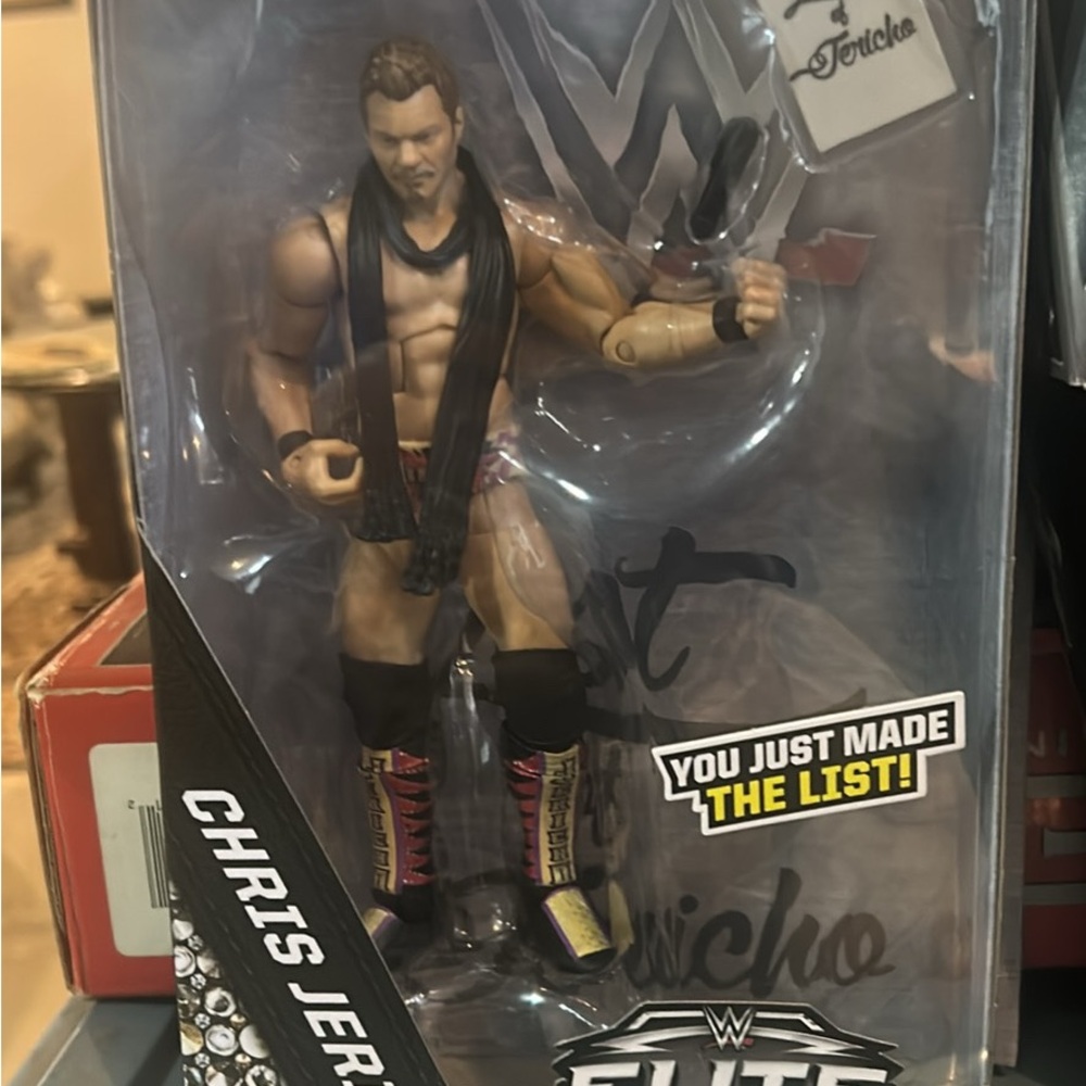 WWE Elite Action Figure with Black and Gold Attire